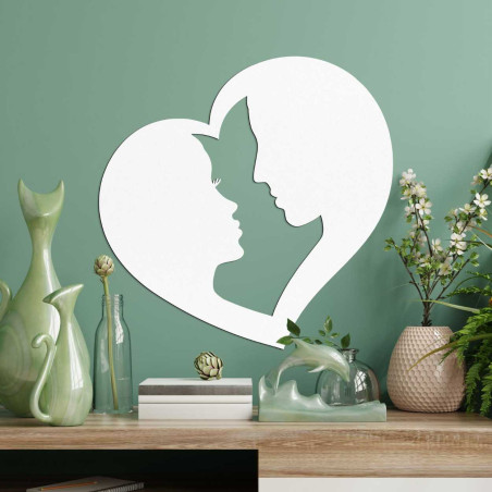 O decorațiune în formă de inimă în care contururile a două fețe sunt conectate.